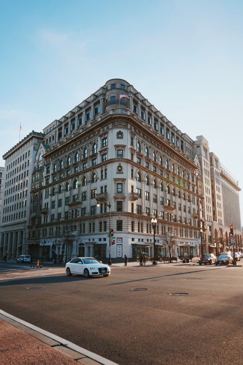 Free Majestic architectural facade of the Bond Building on a sunny day in Washington D.C. Stock Photo