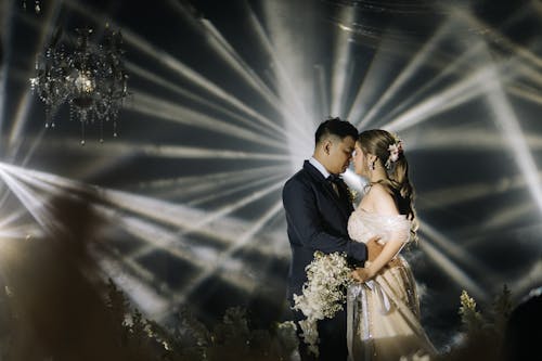 Wedding Couple Illuminated by Spotlights