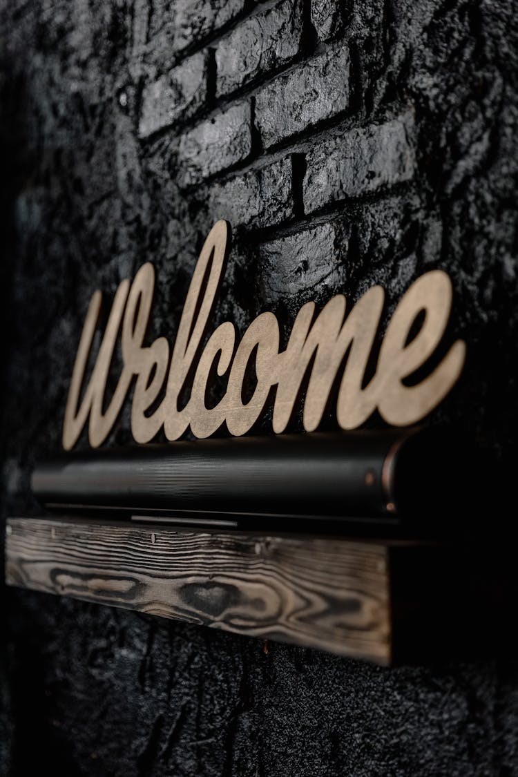 Wooden Carved Word Welcome