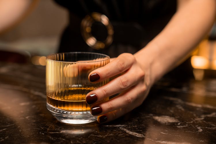 Woman Hand Holding Drink