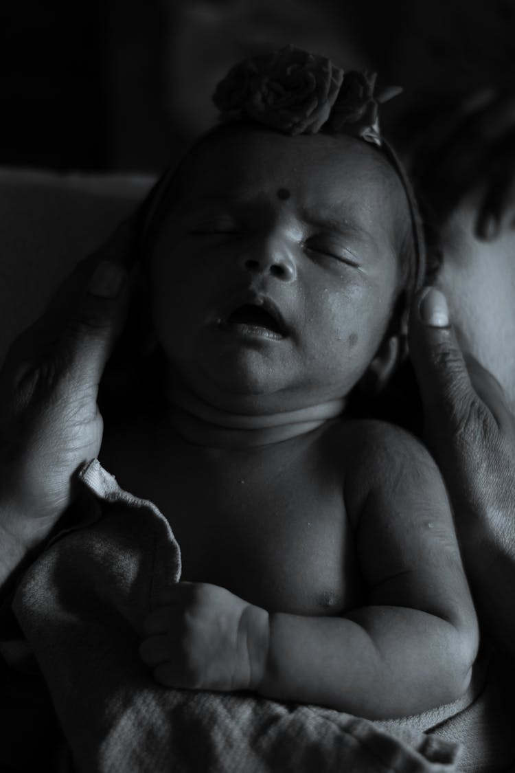 Sleeping Baby In Black And White