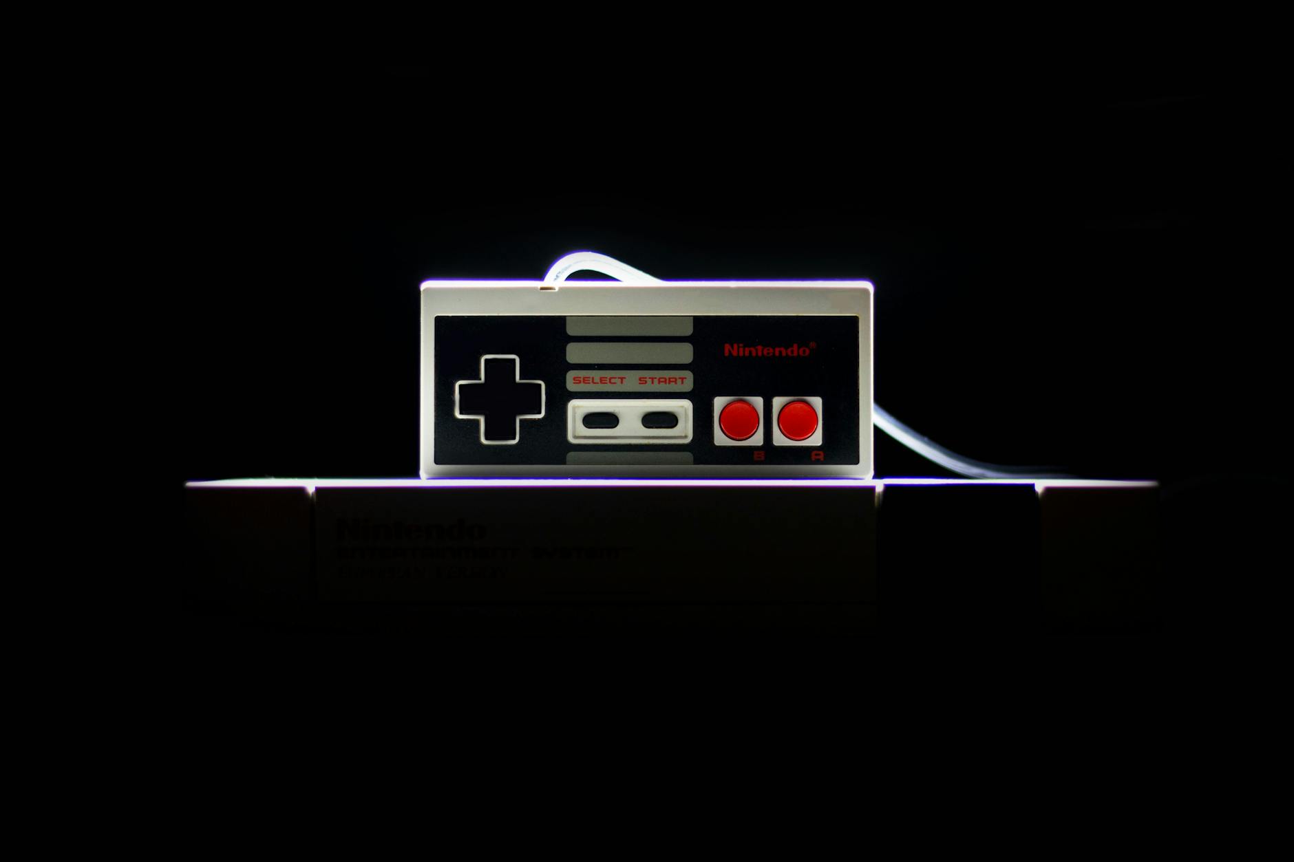 Low-light Photo Of Nes Controller