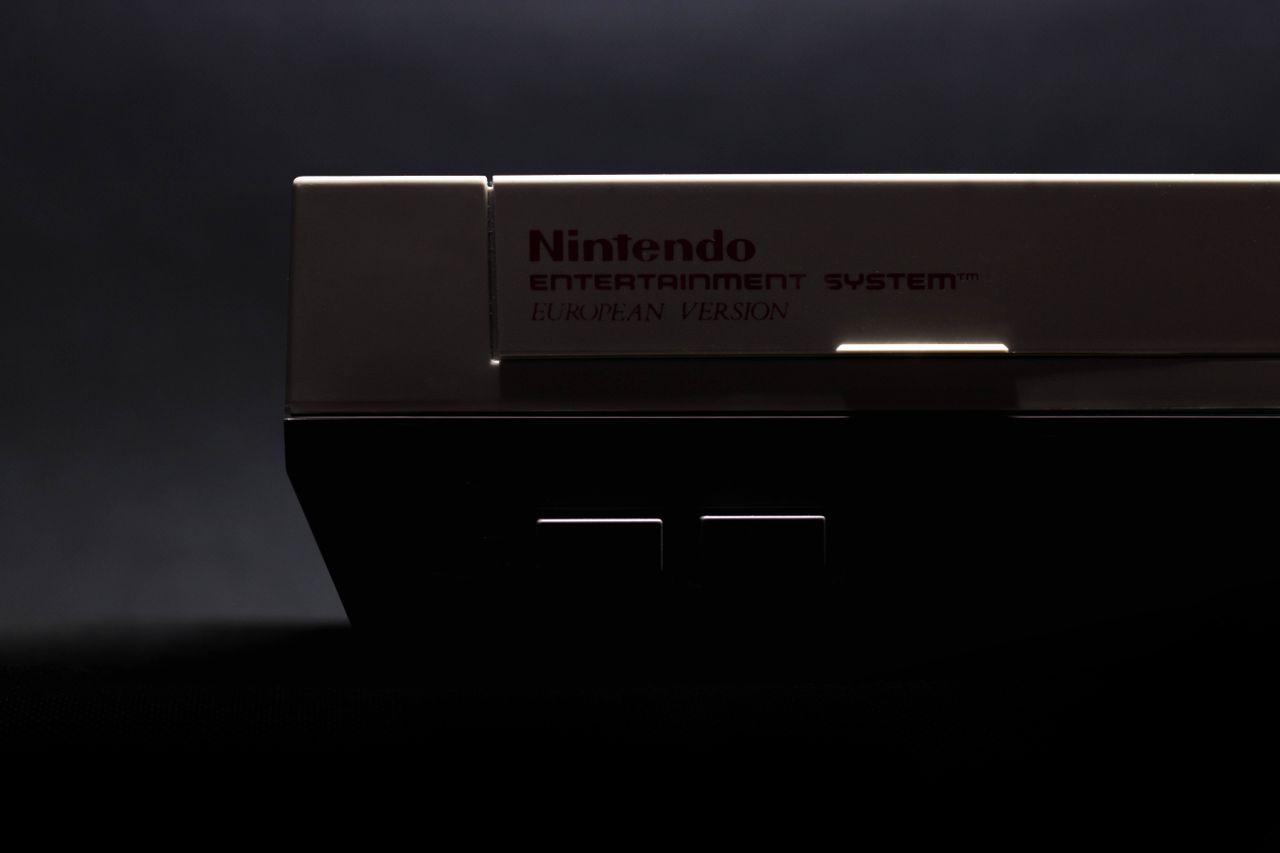 a retro close up shot of a classic nintendo entertainment system in lo