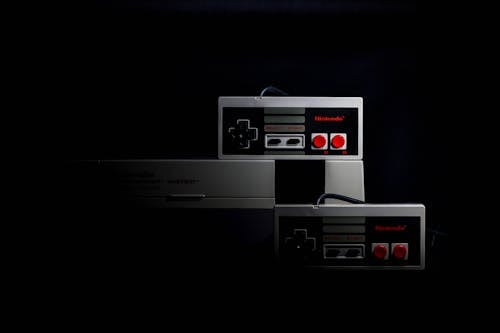 무료 Nintendo Nes 게임 콘솔 세트 스톡 사진