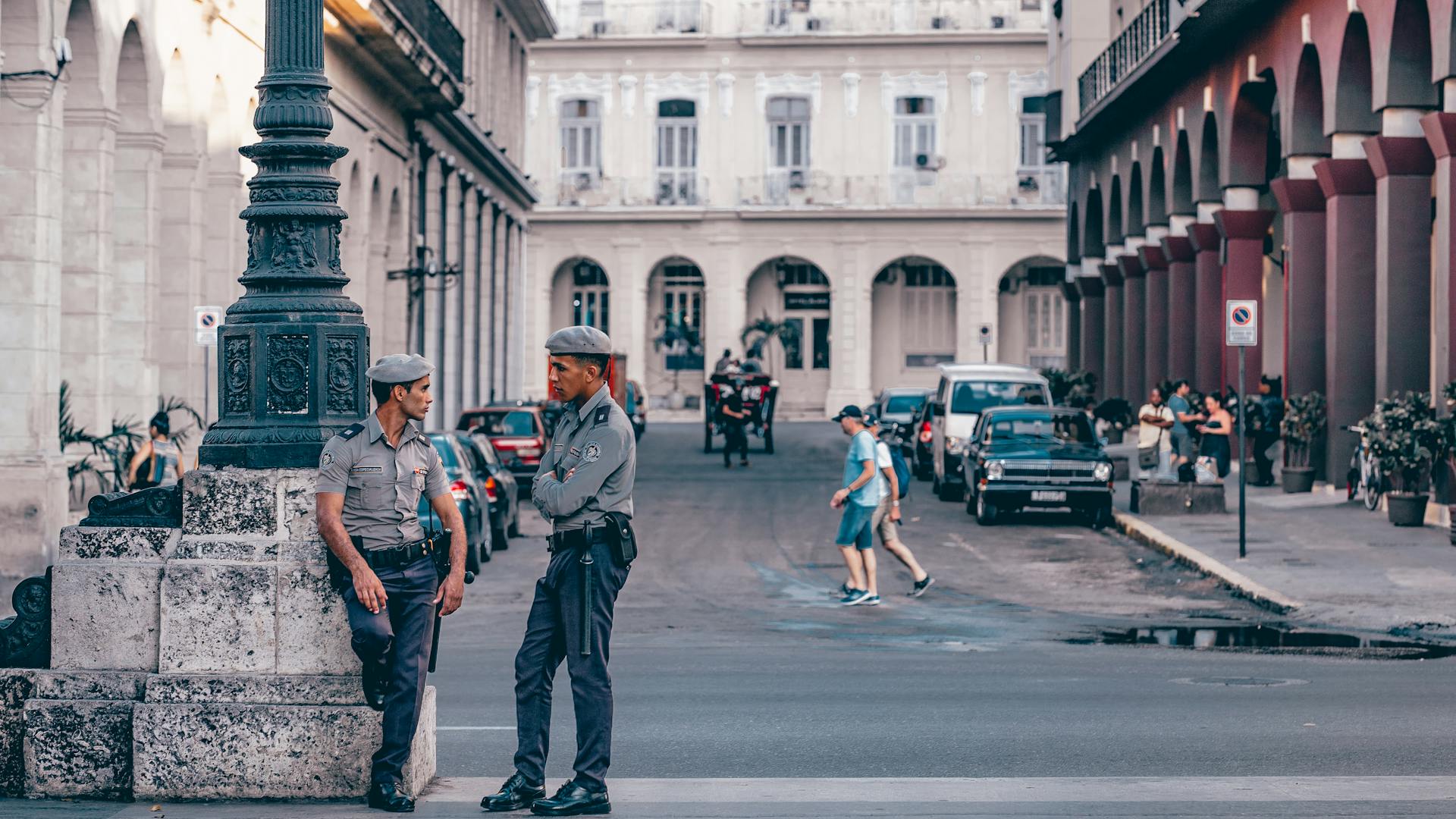 Police Officer Talking To Another Police