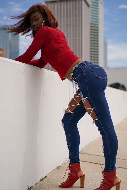 Model Leaning Over the Wall