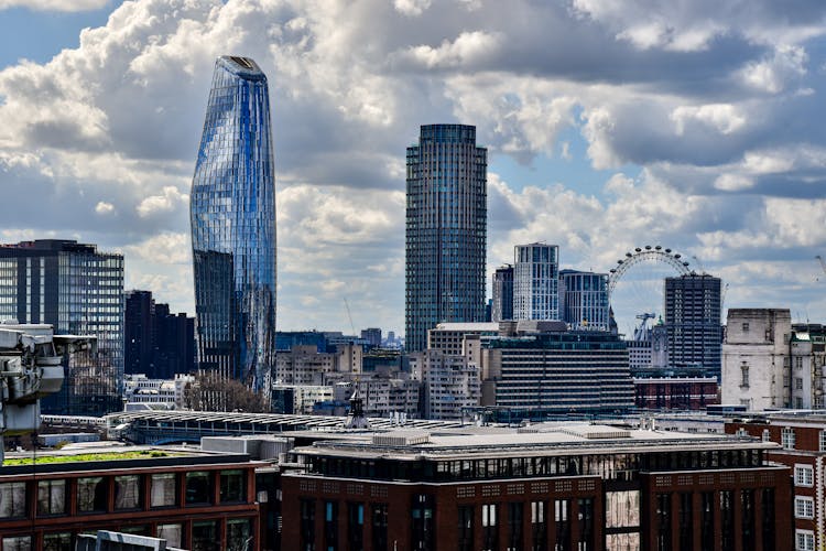 Modern Skyline Of London With View Of Skyscrapers And London Eye In The Background 