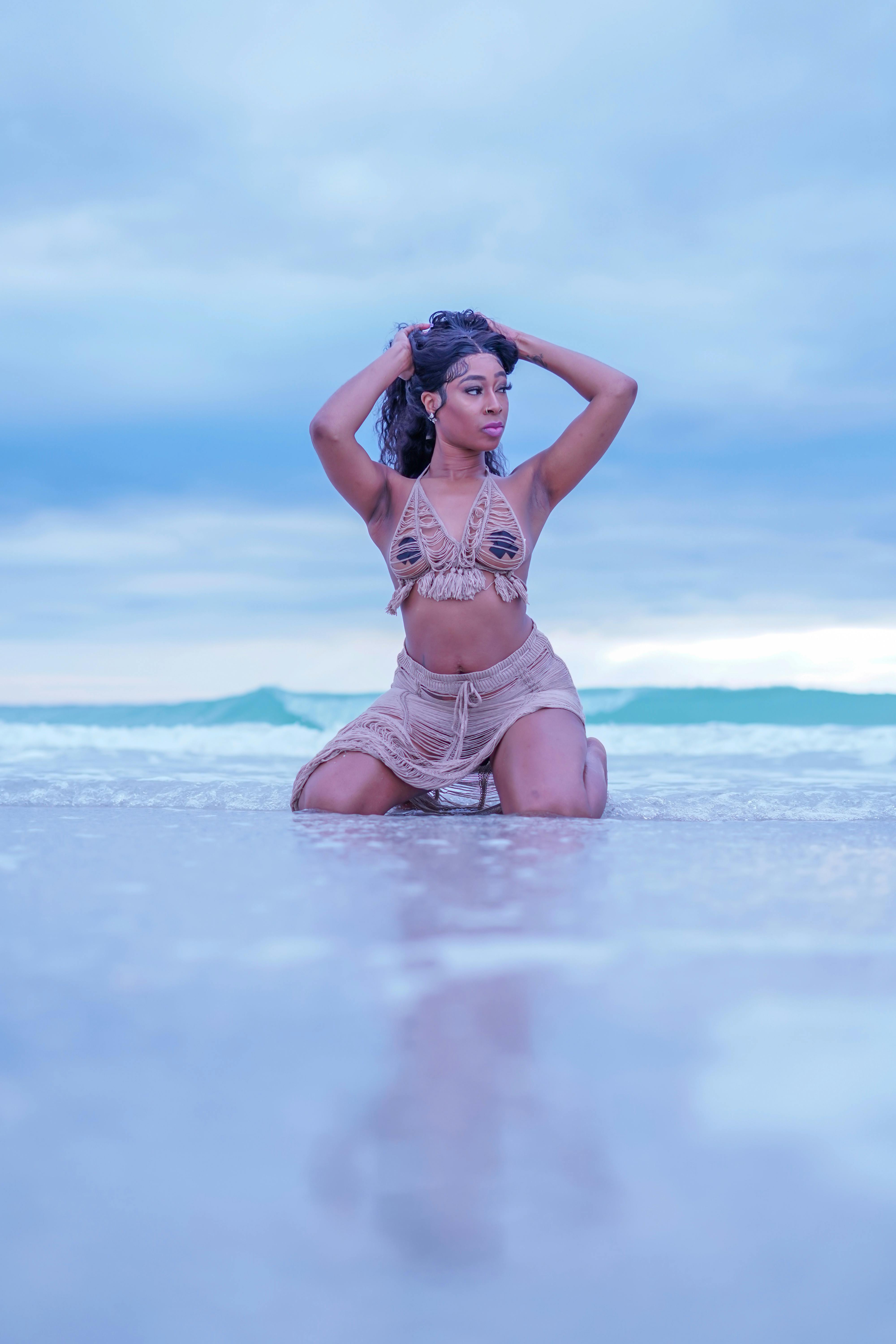 Sexy pretty woman model poses on Holbox beach sandbank Mexico. Stock Photo  | Adobe Stock