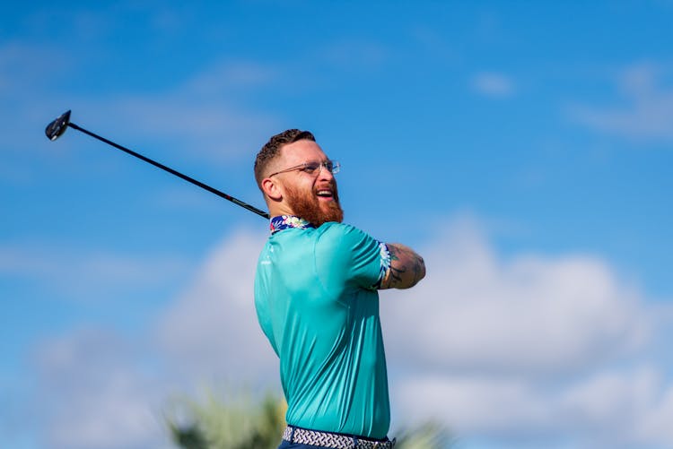 Photo Of Man Playing Golf