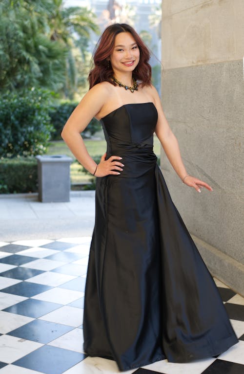 Young Woman in an Elegant Black Dress 