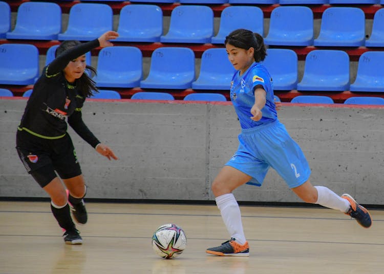 Girls Playing Futsal Match