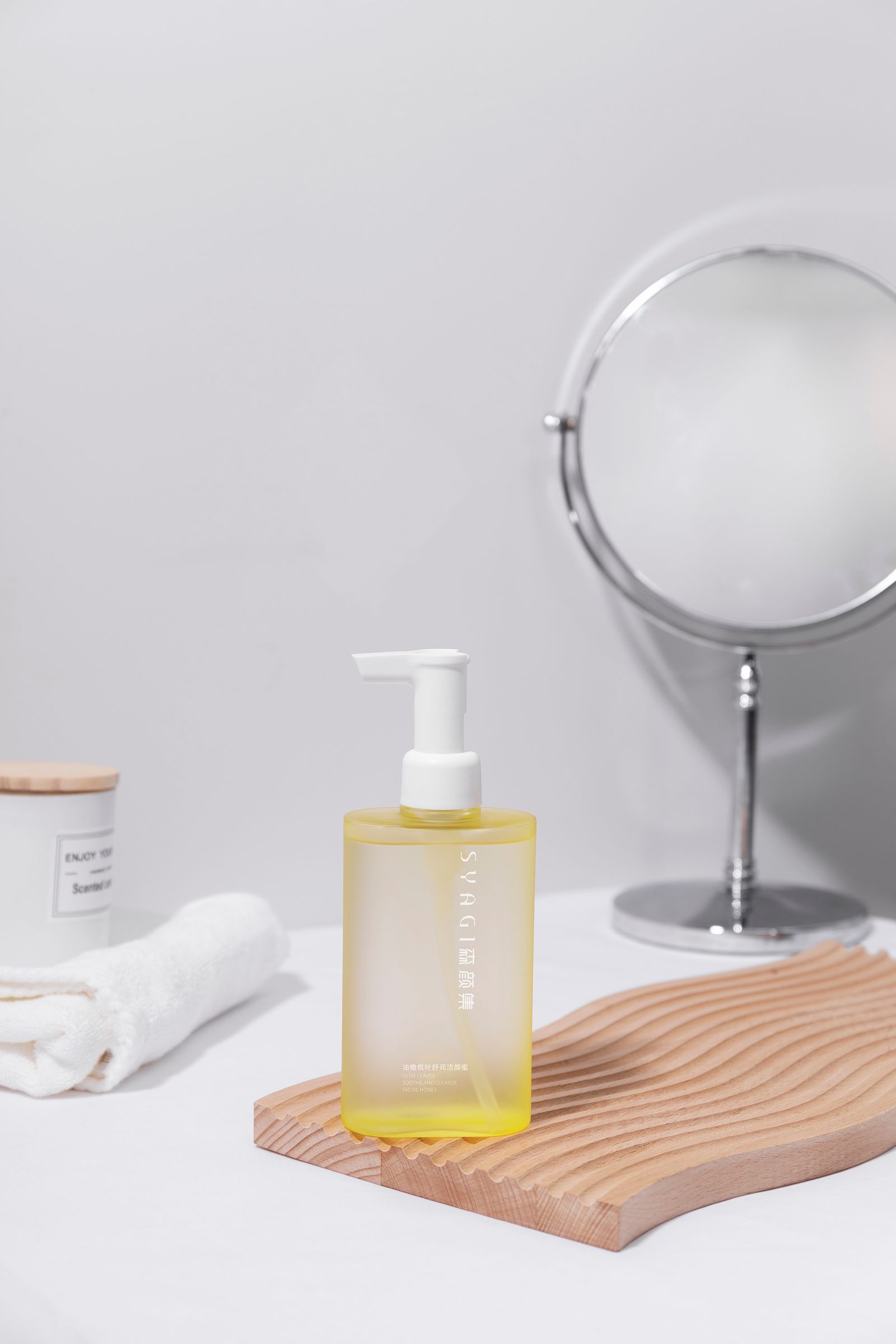 Cream skincare product displayed on a wooden surface without people