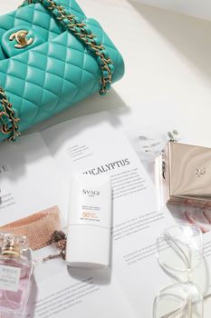 Flat lay composition with luxury fashion accessories and cosmetics on a white background.. flat, composition, with
