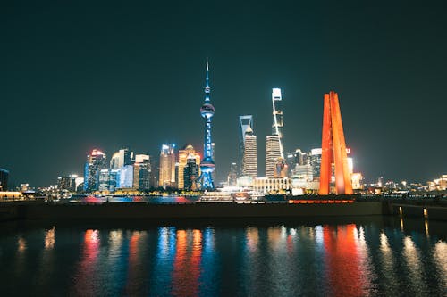 Illuminated Shanghai Downtown seen from the Sea