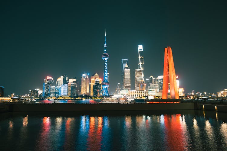 Illuminated Shanghai Downtown Seen From The Sea