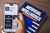 Webpage of Ai Chatbot, a prototype AI Smith Open chatbot, is seen on the website of OpenAI, on a apple smartphone. Examples, capabilities, and limitations are shown.