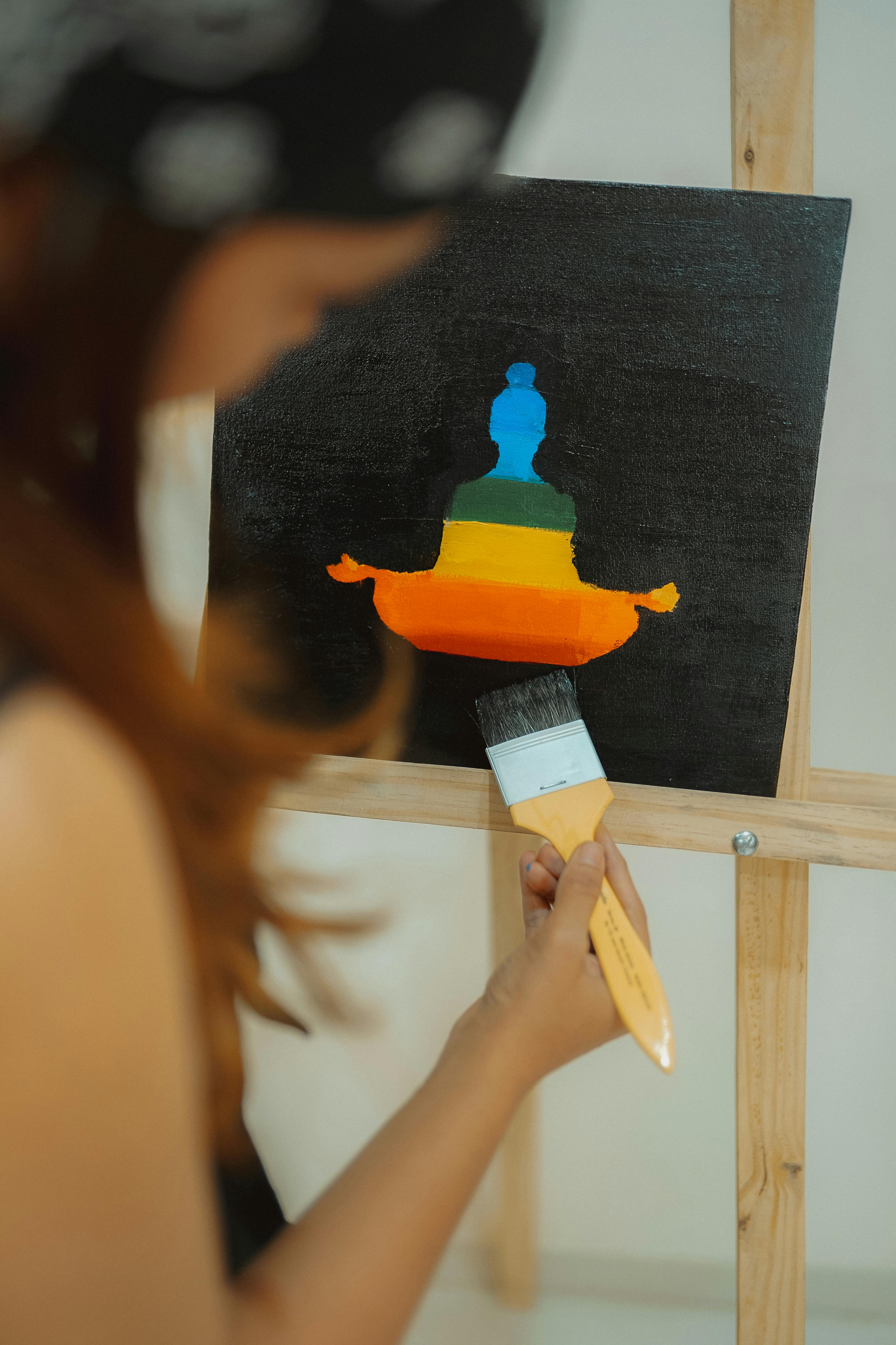 Free Woman Painting with Paintbrush Stock Photo