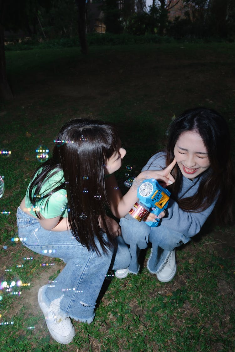 Young Girls At The Park In The Evening