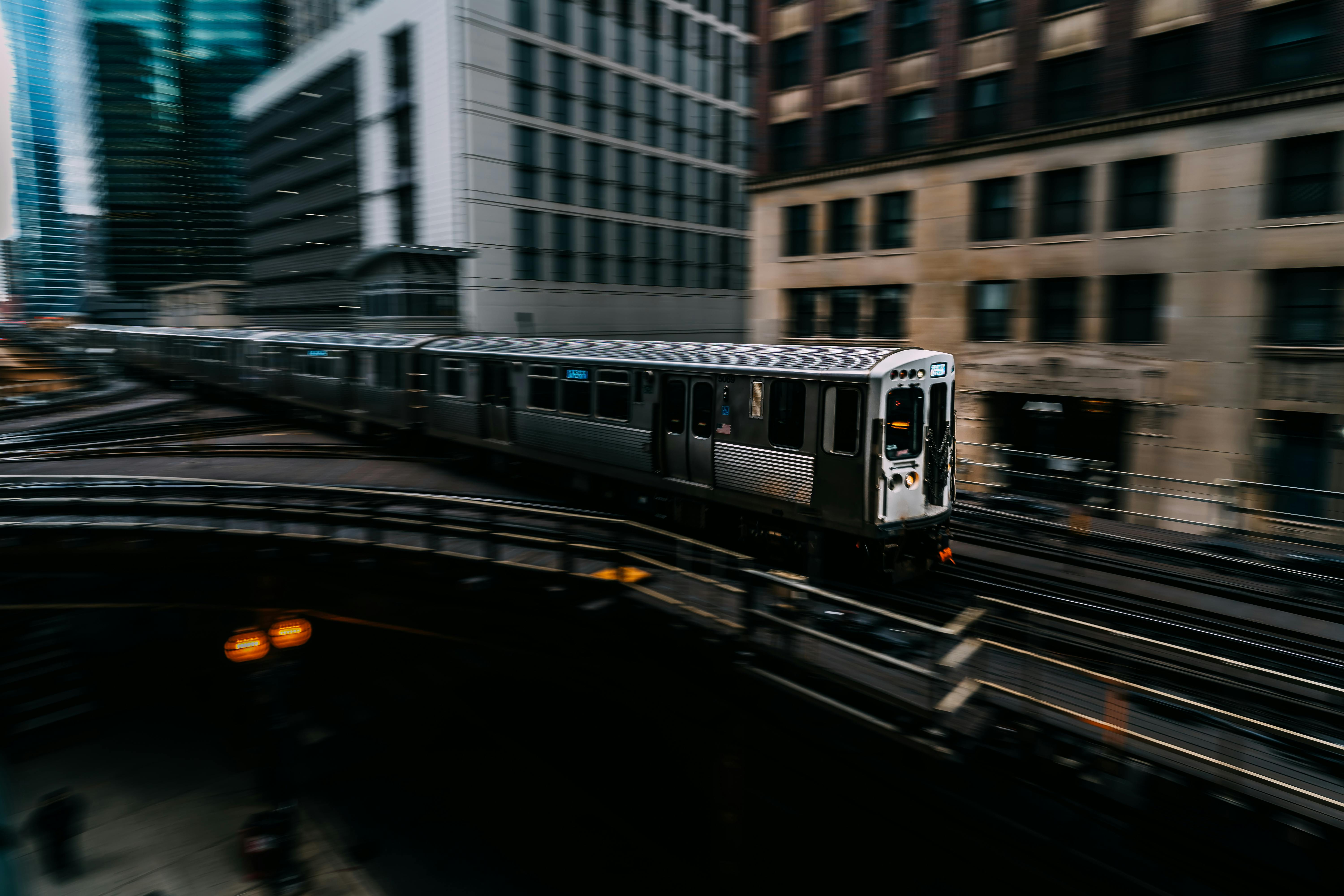 Speeding Gray and Black Train