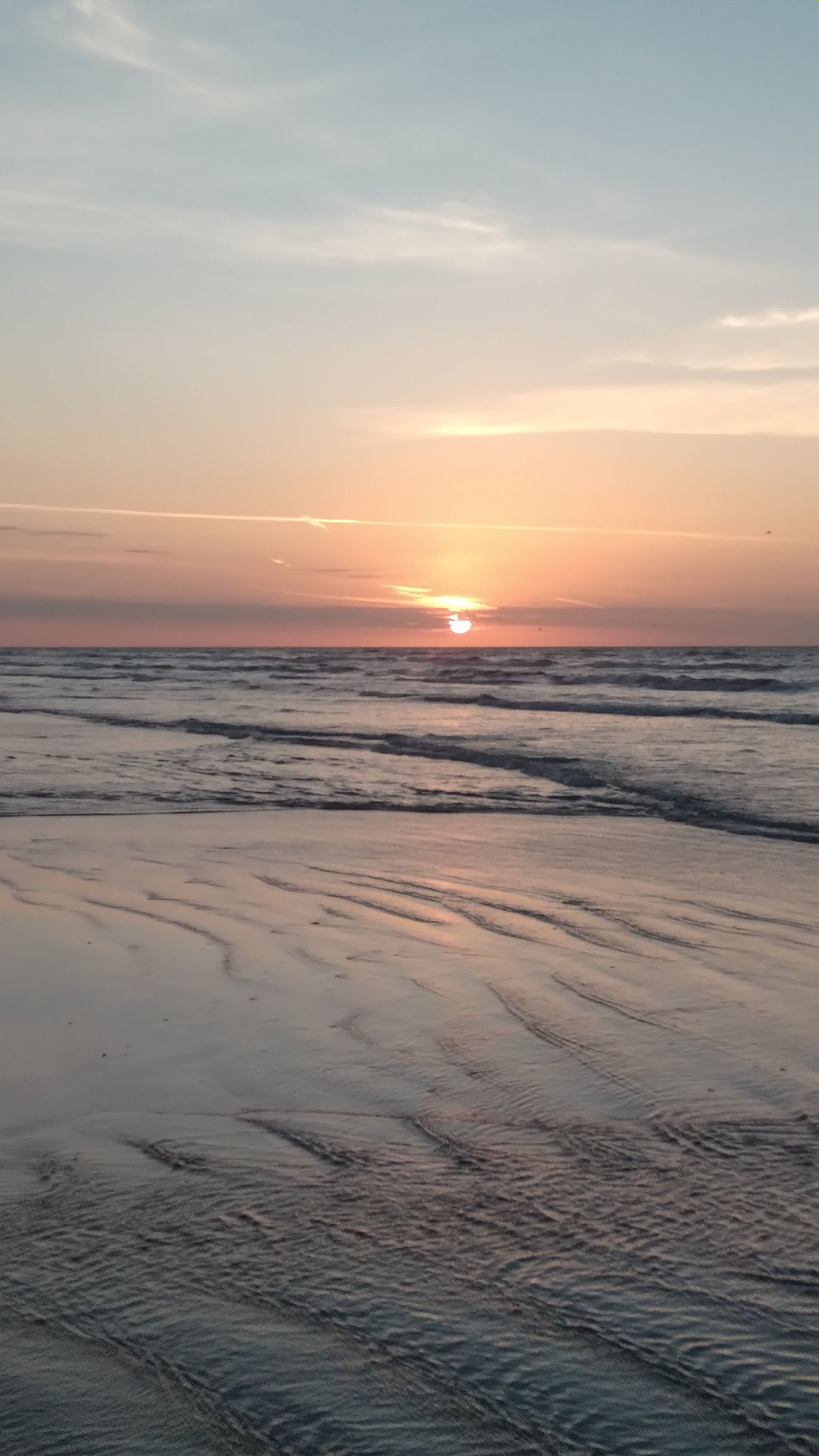 Scenic View of Ocean During Sunset · Free Stock Photo