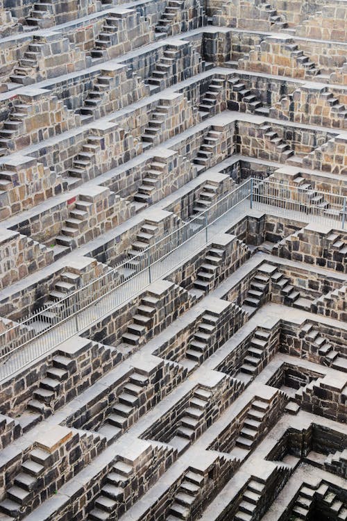 Free Walls of the Chand Baori Stepwell, Abhaneri, Rajasthan, India Stock Photo