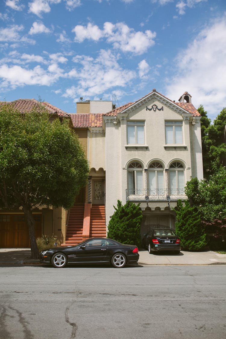 Cars Parked By House By Street