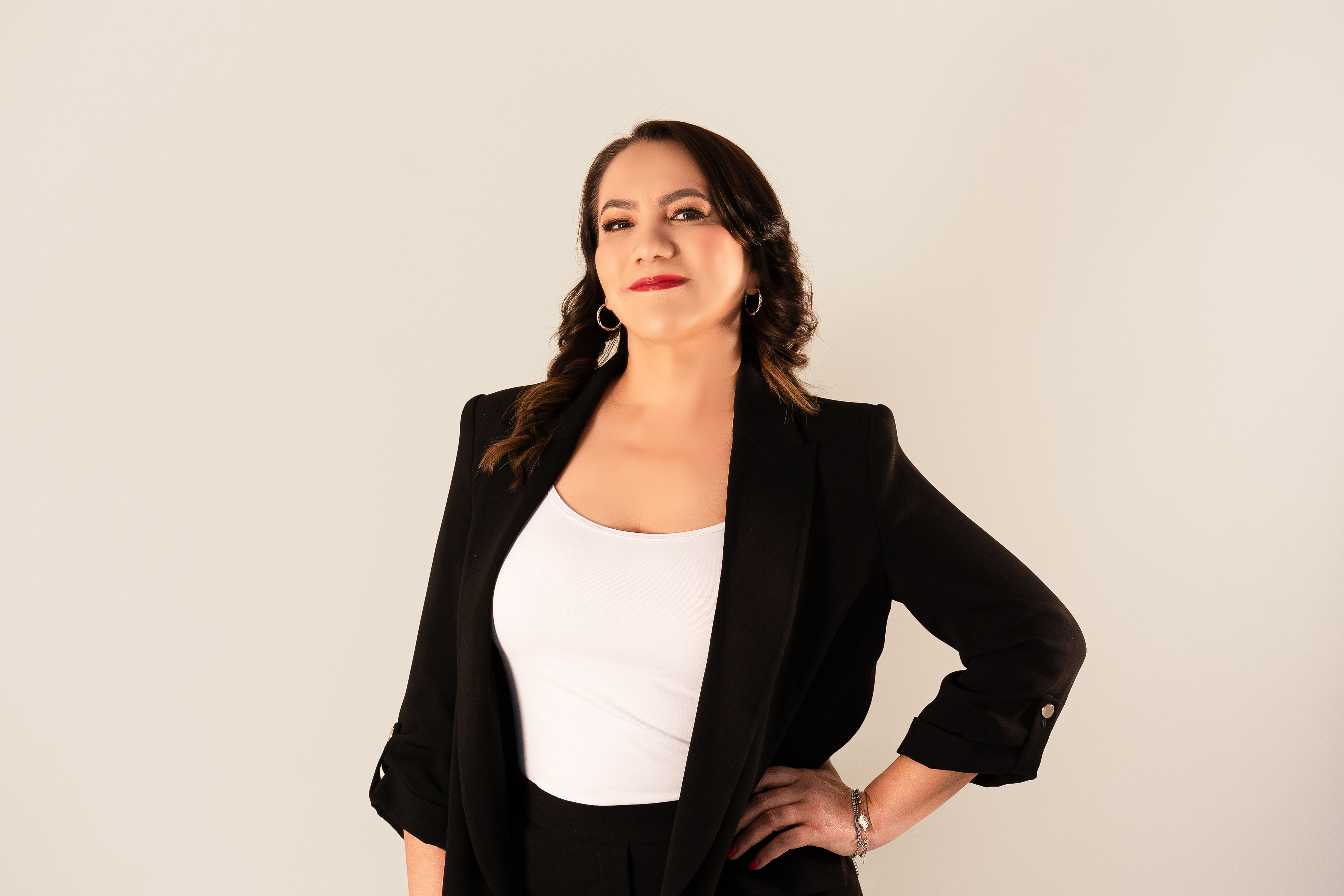 Woman Posing in Suit · Free Stock Photo