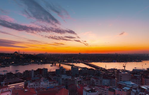 Foto profissional grátis de alvorecer, cair da noite, cidade