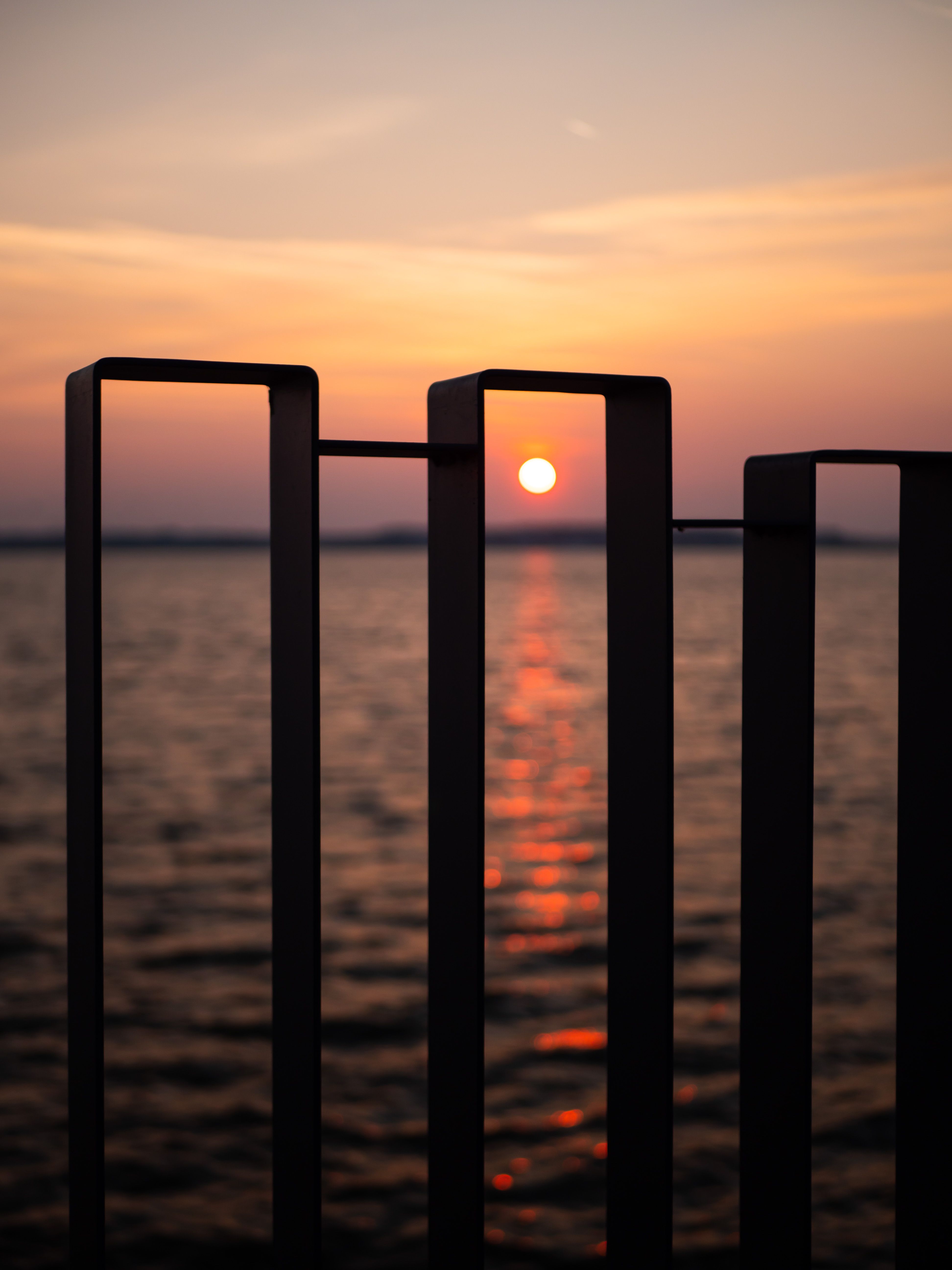 Sunset Seen Through Fence · Free Stock Photo