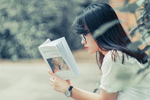 Free Woman Reading Book Stock Photo