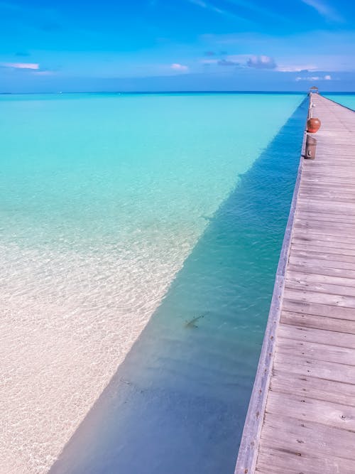 A Pier Over a Blue Sea