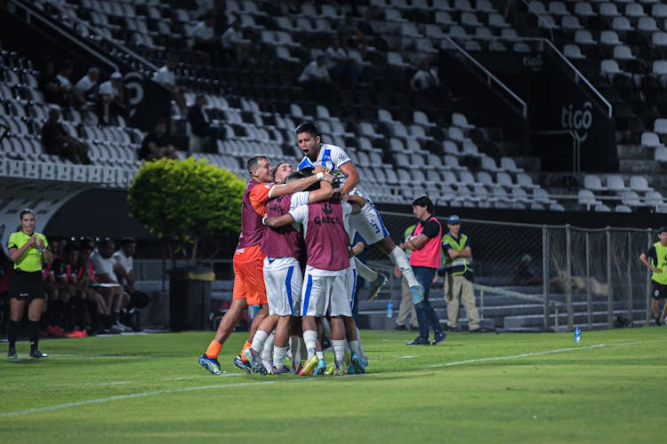 Football Team Enjoying Winning A Game