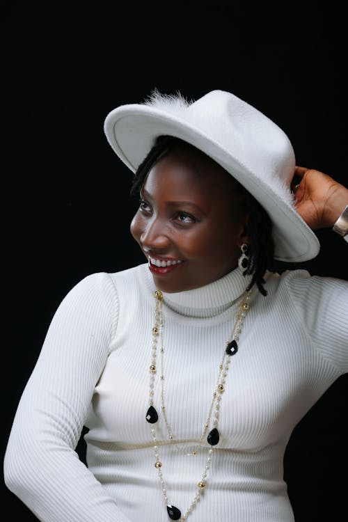 Smiling Woman Posing in White Clothes