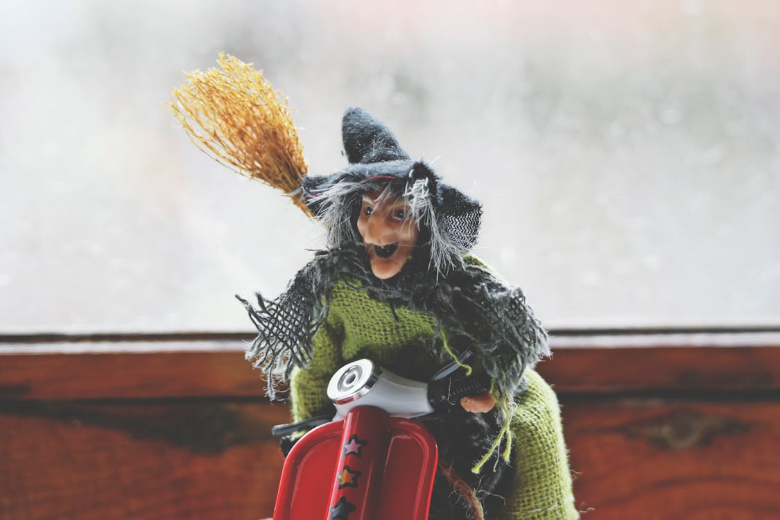Witch Riding Motorcycle Toy