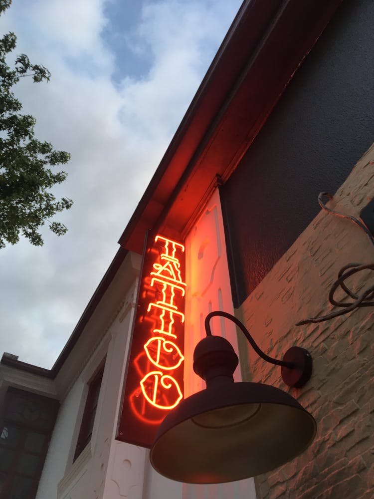 Neon Of Tattoo Studio On Wall