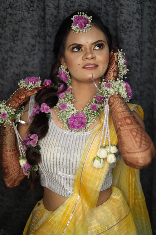 A Bride in Traditional Clothing and with Henna Tattoos 