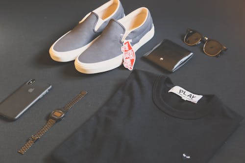 Free Pair of Gray Vans Low-top Sneakers Beside Black Shirt, Sunglasses, and Watch Stock Photo