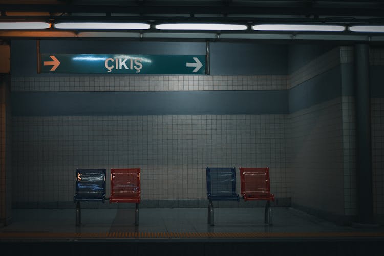 Blue And Red Seats On The Subway Station Platform