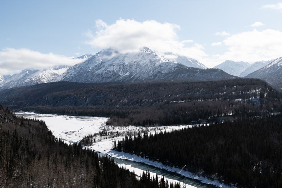 Unforgettable Private Guided 10 Passenger Tour to Sitka Review: An Unforgettable Alaska Wildlife Expedition Review 2026 - Stunning aerial view of snowy mountains and river in Alaska under clear skies.
