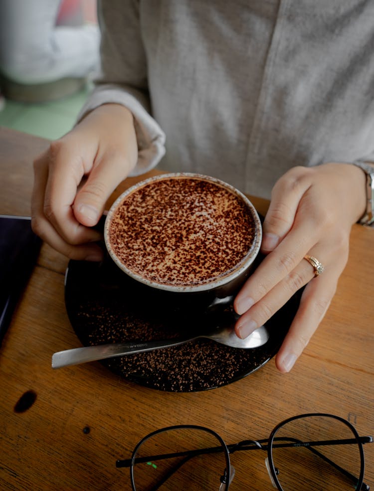 Woman Hands Holding Coffee Cup With Chocolate