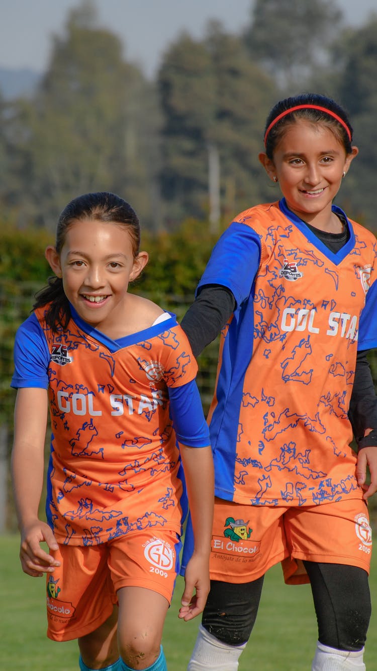 Photo Of Two Girls In Soccer Clothes