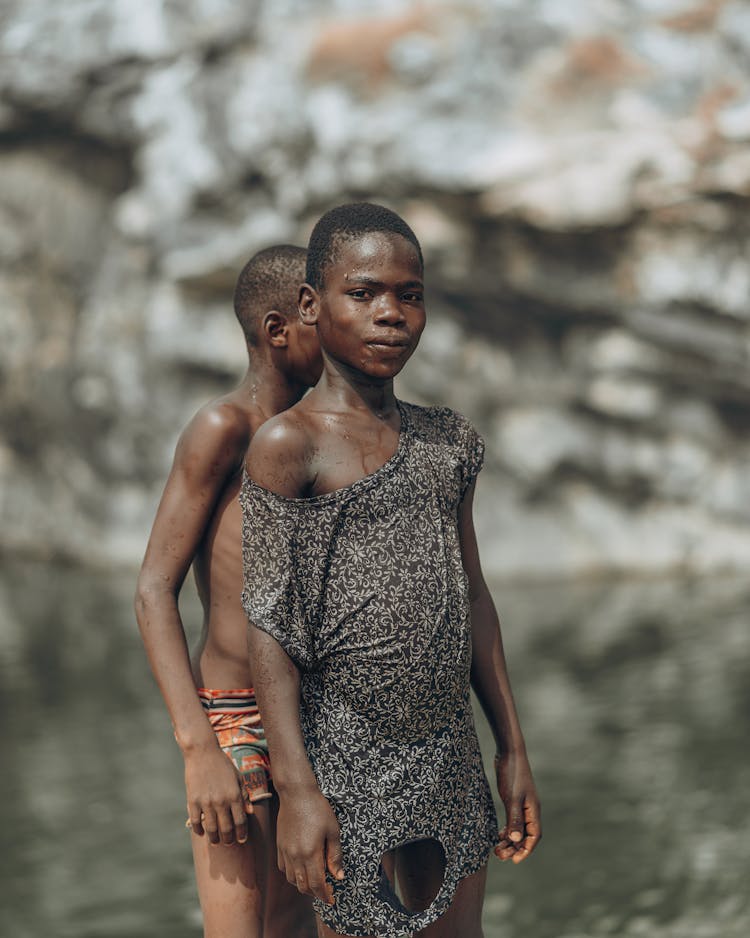 Boys Standing In River