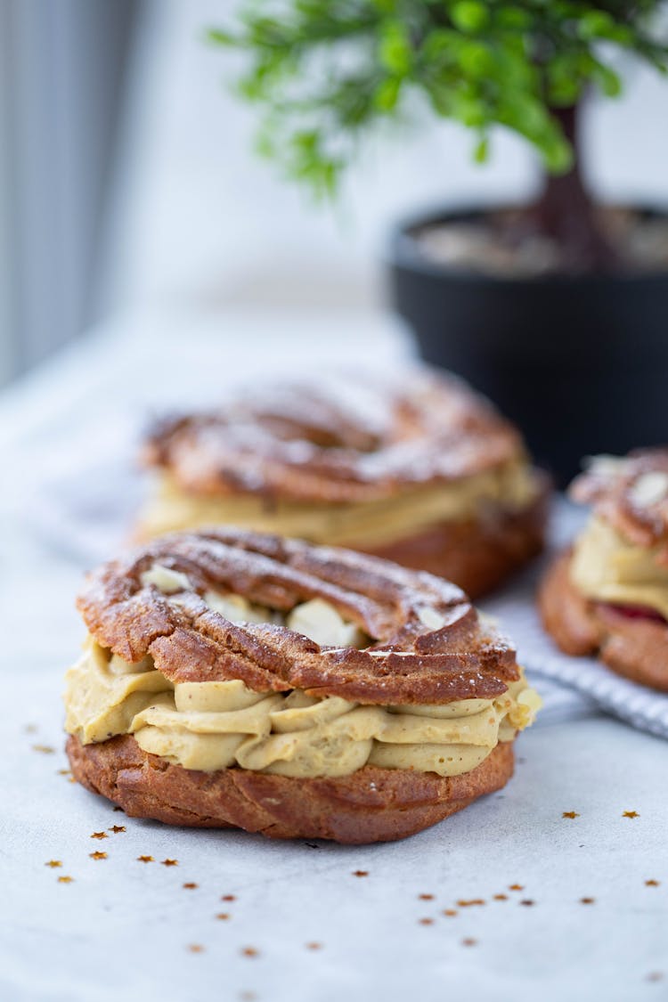 Cream Filled Pastries Lying On White Table