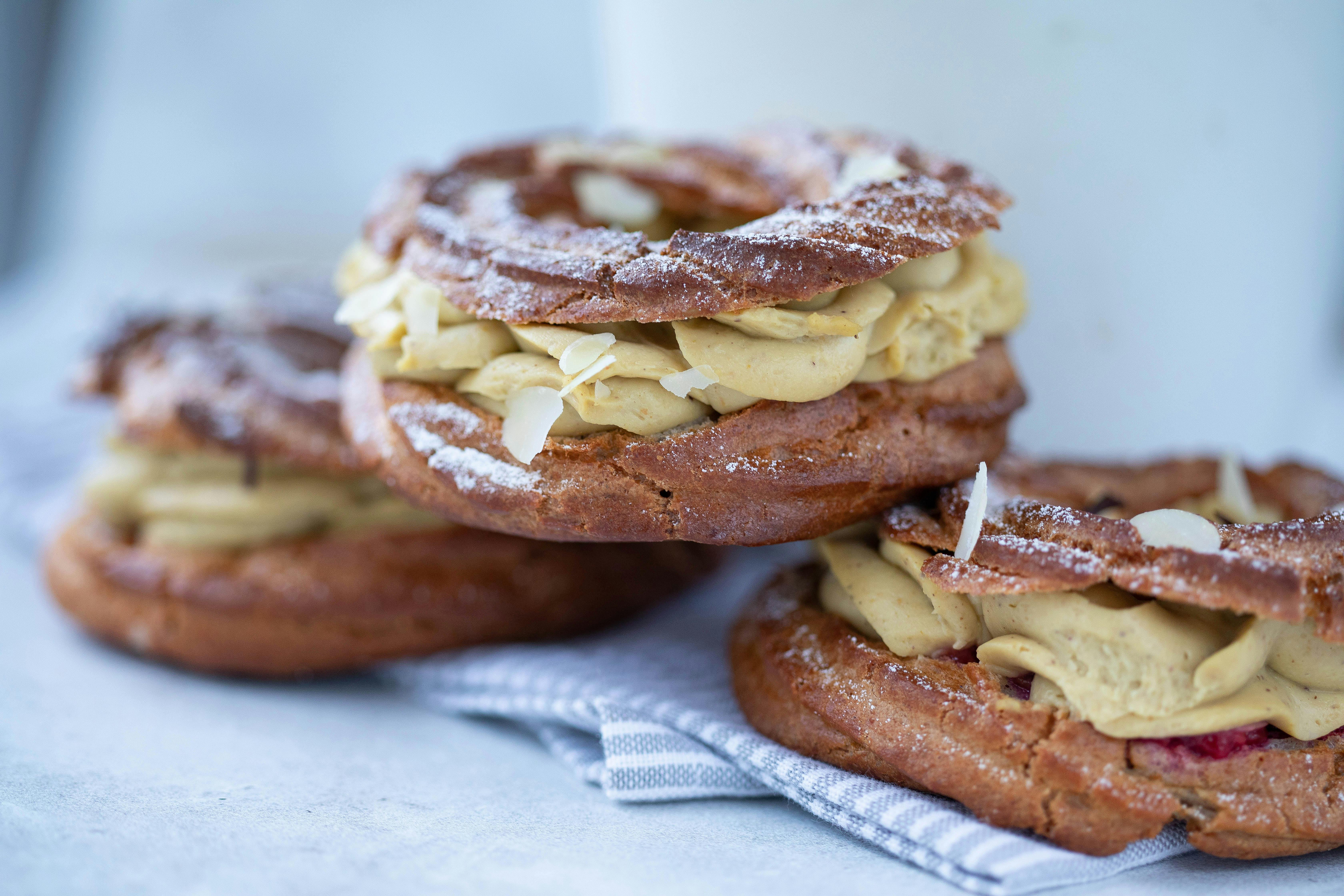 Paris-Brest pastry with praline cream filling and sliced almonds - french desserts
