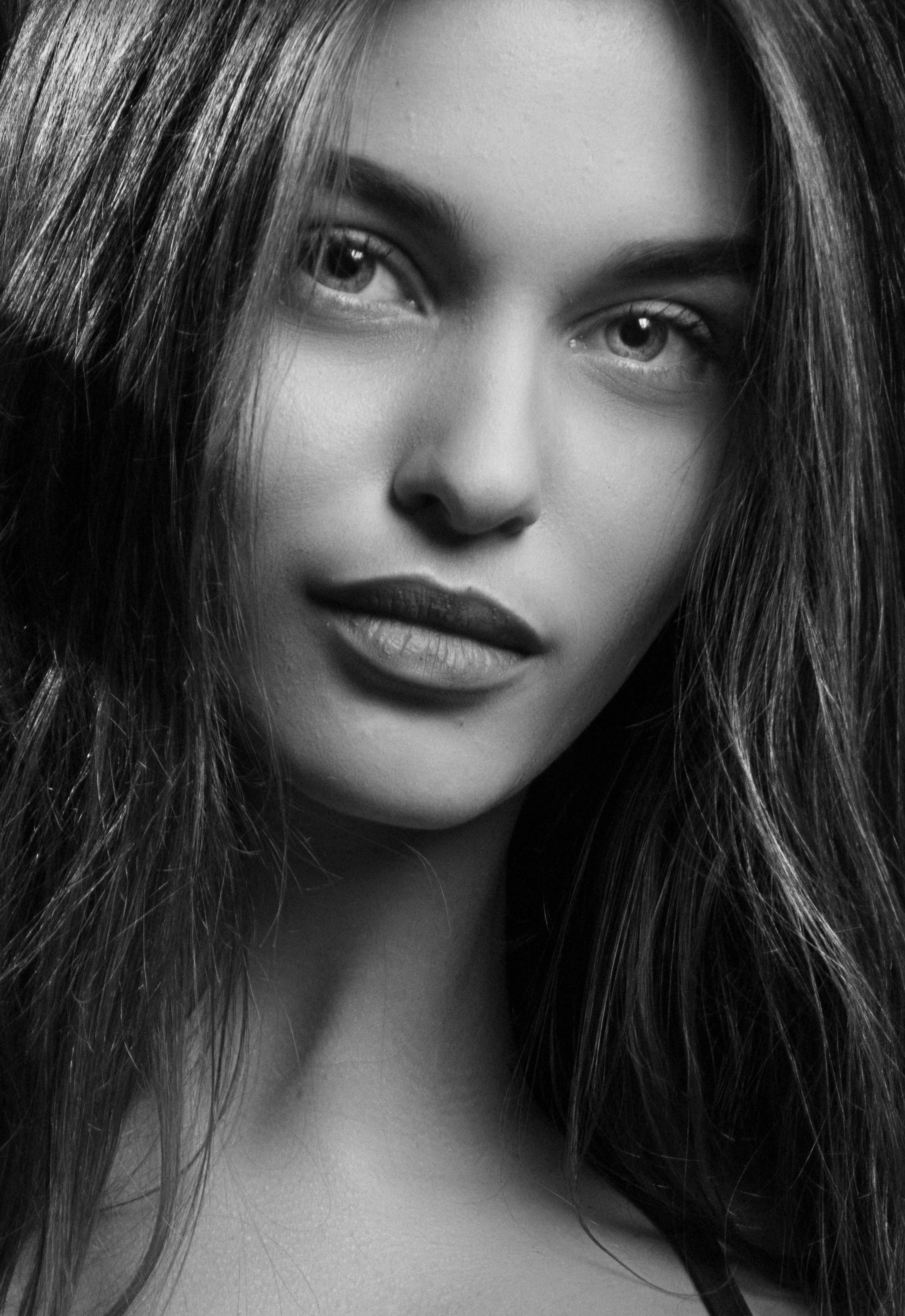 Stunning black and white portrait capturing the elegance and beauty of a woman.