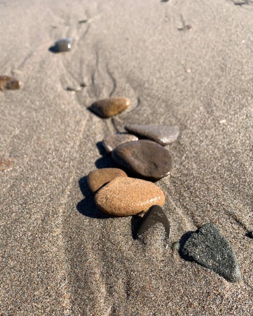 Free stock photo of rocks on a beach