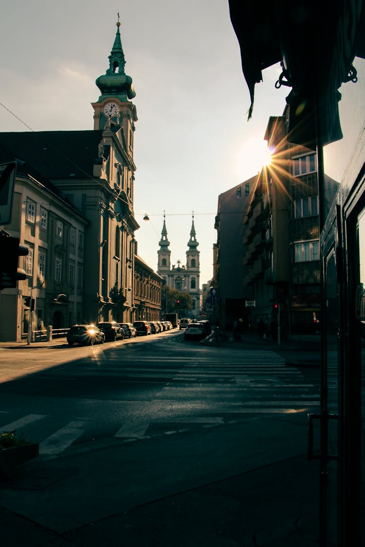 Street In Budapest With Church At Sunset