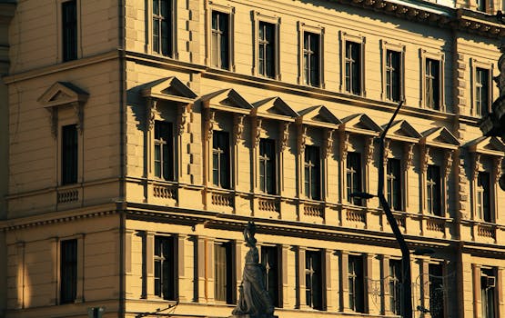 Capture of a historic architecture facade in Budapest during daylight, highlighting classic urban charm.