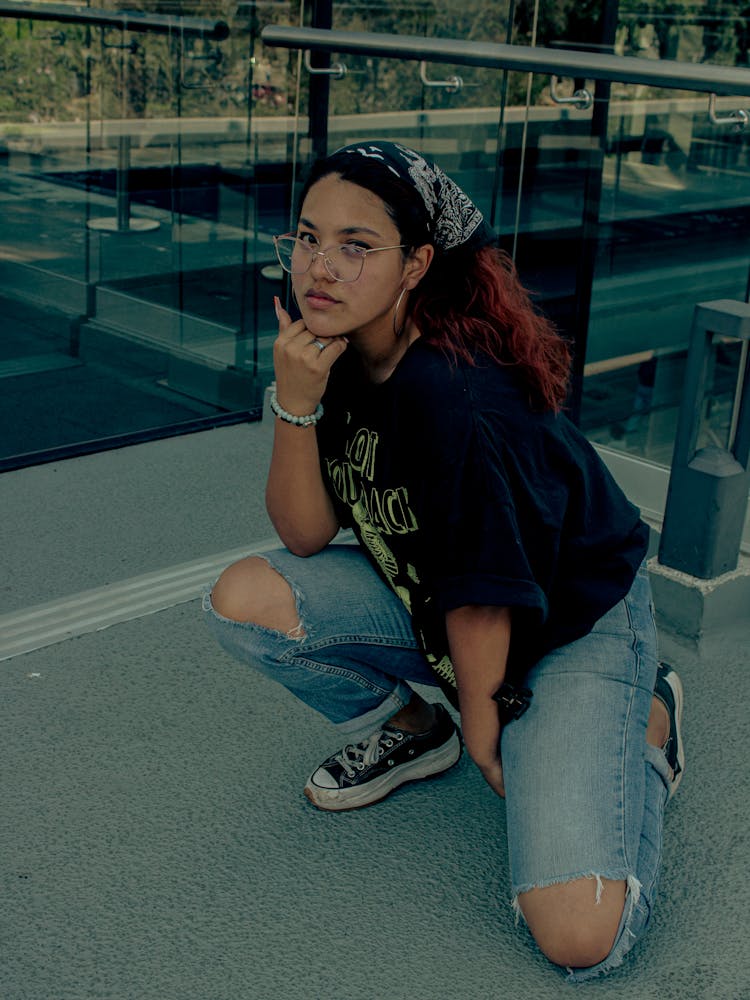 Young Woman Posing On The Roof Terrace