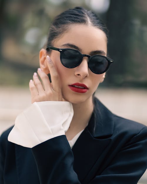 Woman in Sunglasses and with Lipstick